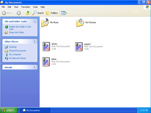 The My Documents folder open on the desktop, containing the My Music and My Pictures folders, as well as other files